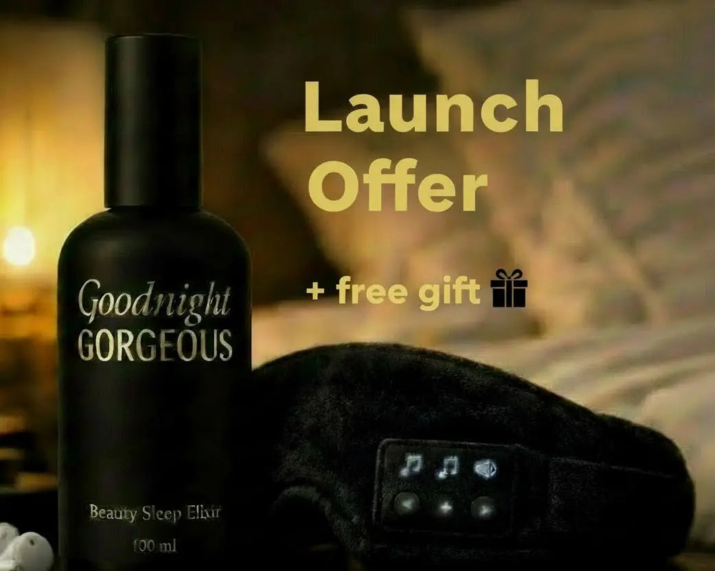 Black bottle labeled 'Goodnight Gorgeous' with a sleep mask on a wooden surface.