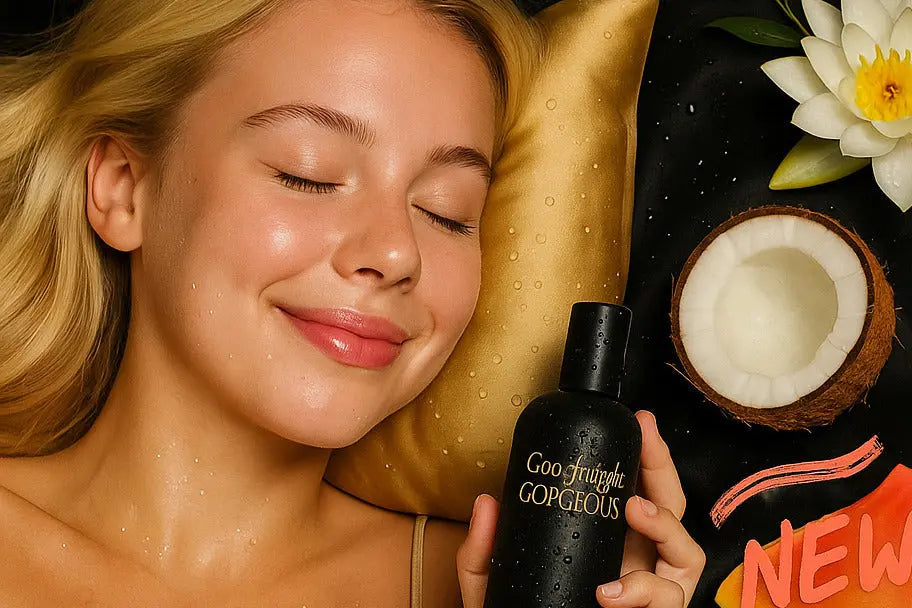 Woman holding a black bottle labeled with a coconut and papaya on a dark background.