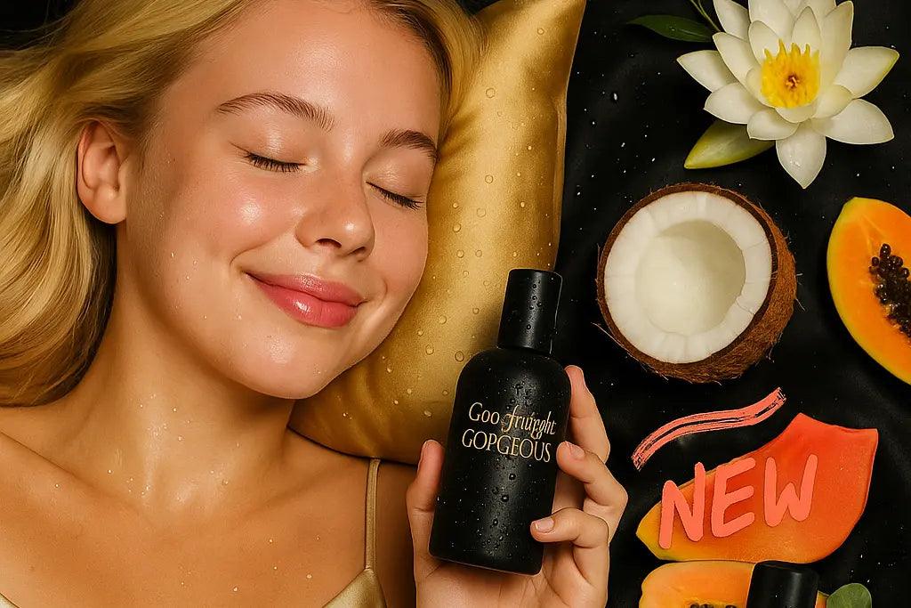 Woman holding a black bottle labeled with a coconut and papaya on a dark background.